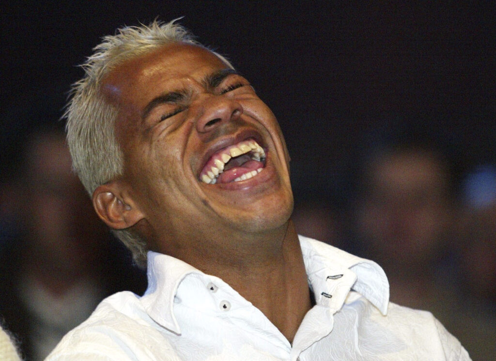 Ex-jogador do Flamengo, Marcelinho Paraíba alegre e rindo