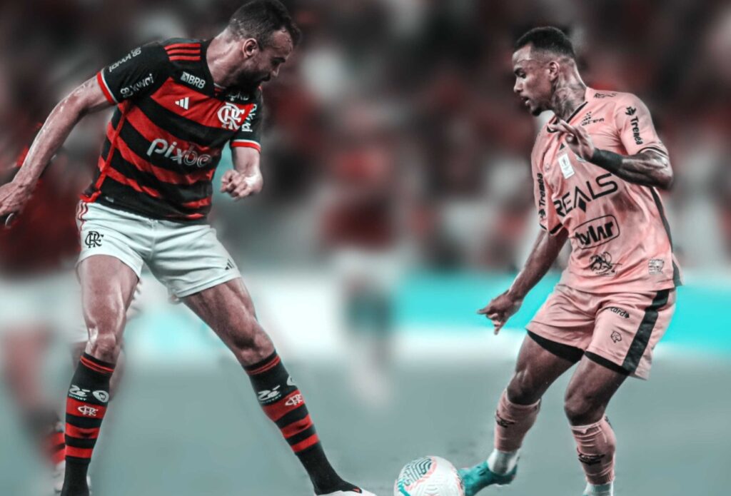 Flamengo vence o Amazonas novamente por 1 a 0 no jogo da volta; na foto, o driblador Serafim tenta passar por Fabricio Bruno